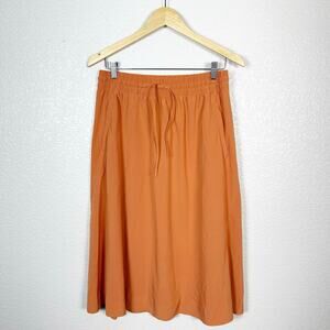 Athleta Womens Arrival Knee Length Athleisure Travel Skirt in Orange Size 10